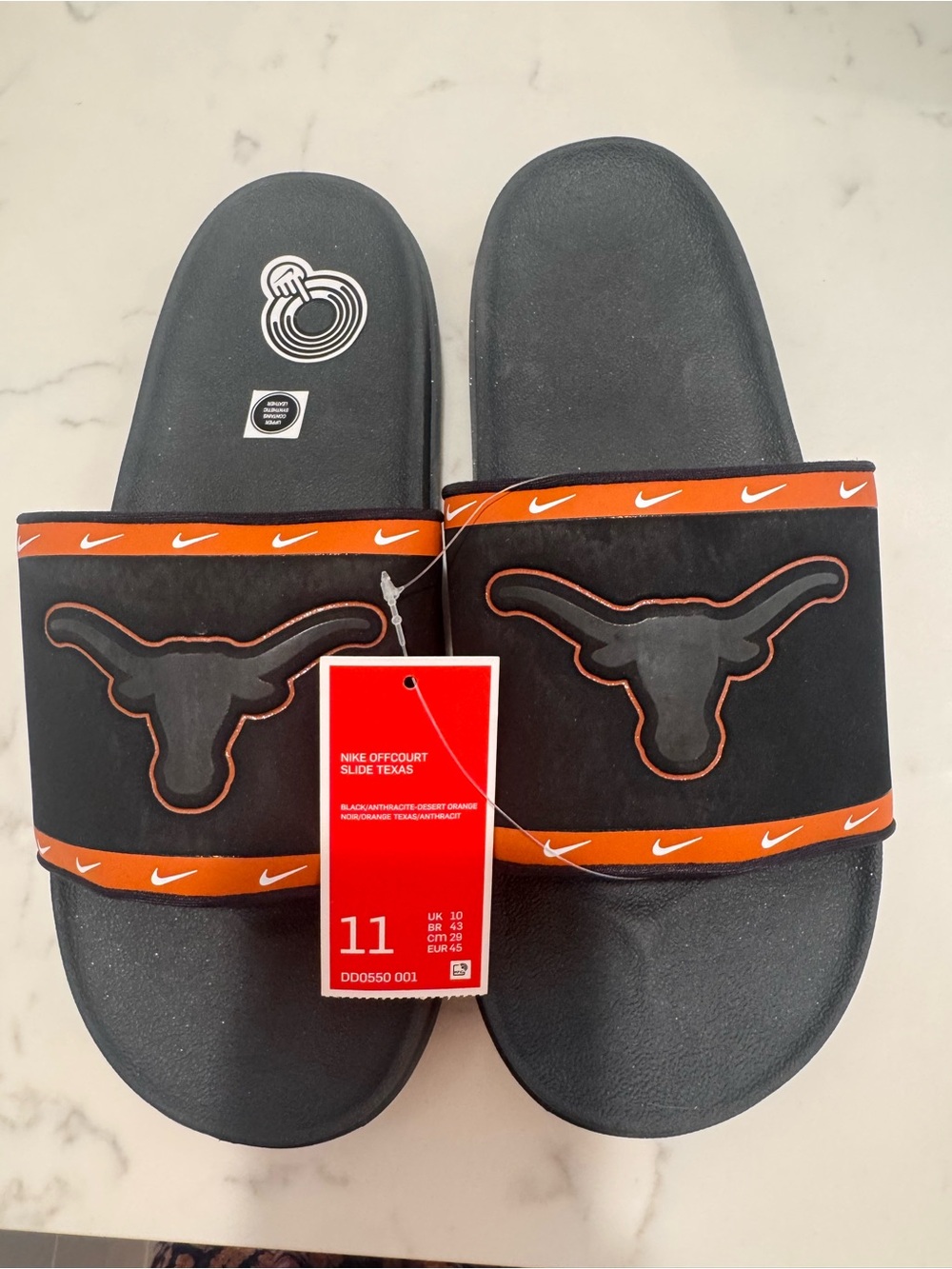 Nike Men’s Black and Orange Longhorn Offcourt Slide Sandals
